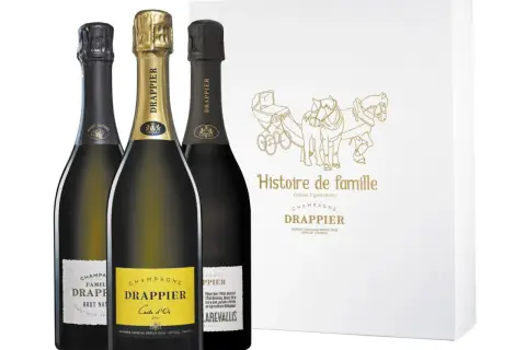 Trois bouteilles de champagne Drappier, dont une Carte d'Or, et une boîte "Histoire de famille". Avis sur le champagne Drappier.