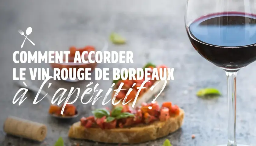 Verre de vin rouge, bruschettas et bouchon de liège. Idées pour savoir quoi grignoter avec du vin rouge à l'apéritif.