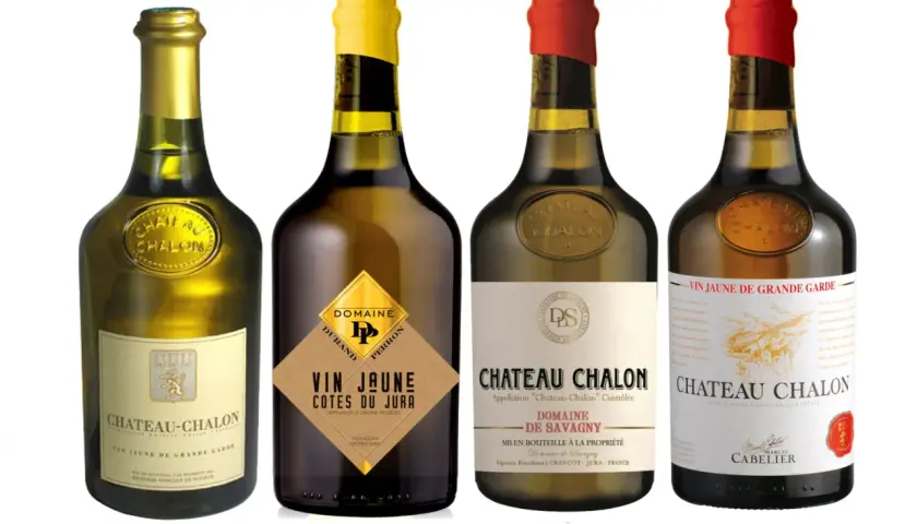 Quatre bouteilles de vin jaune du Jura, dont Château-Chalon et Côtes du Jura, présentées sur fond blanc.