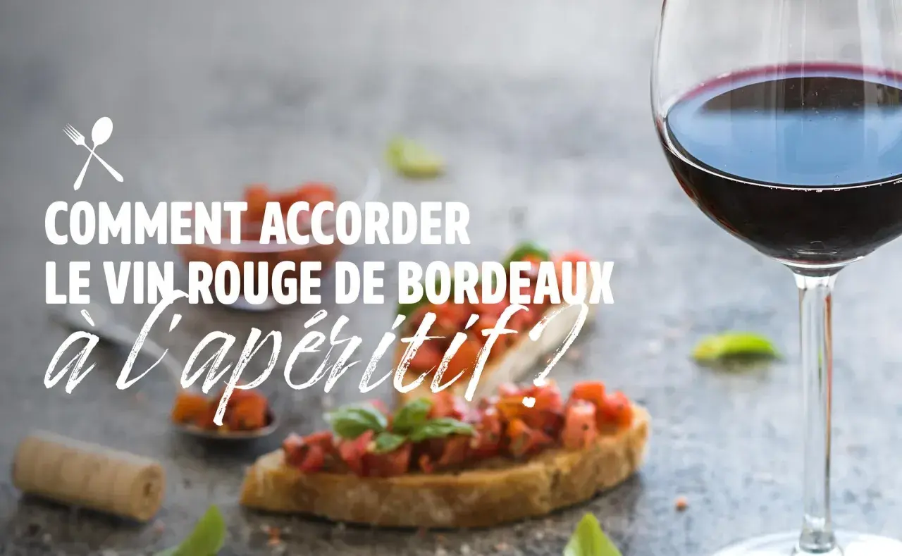 Verre de vin rouge, bruschettas et bouchon de liège. Idées pour savoir quoi grignoter avec du vin rouge à l'apéritif.