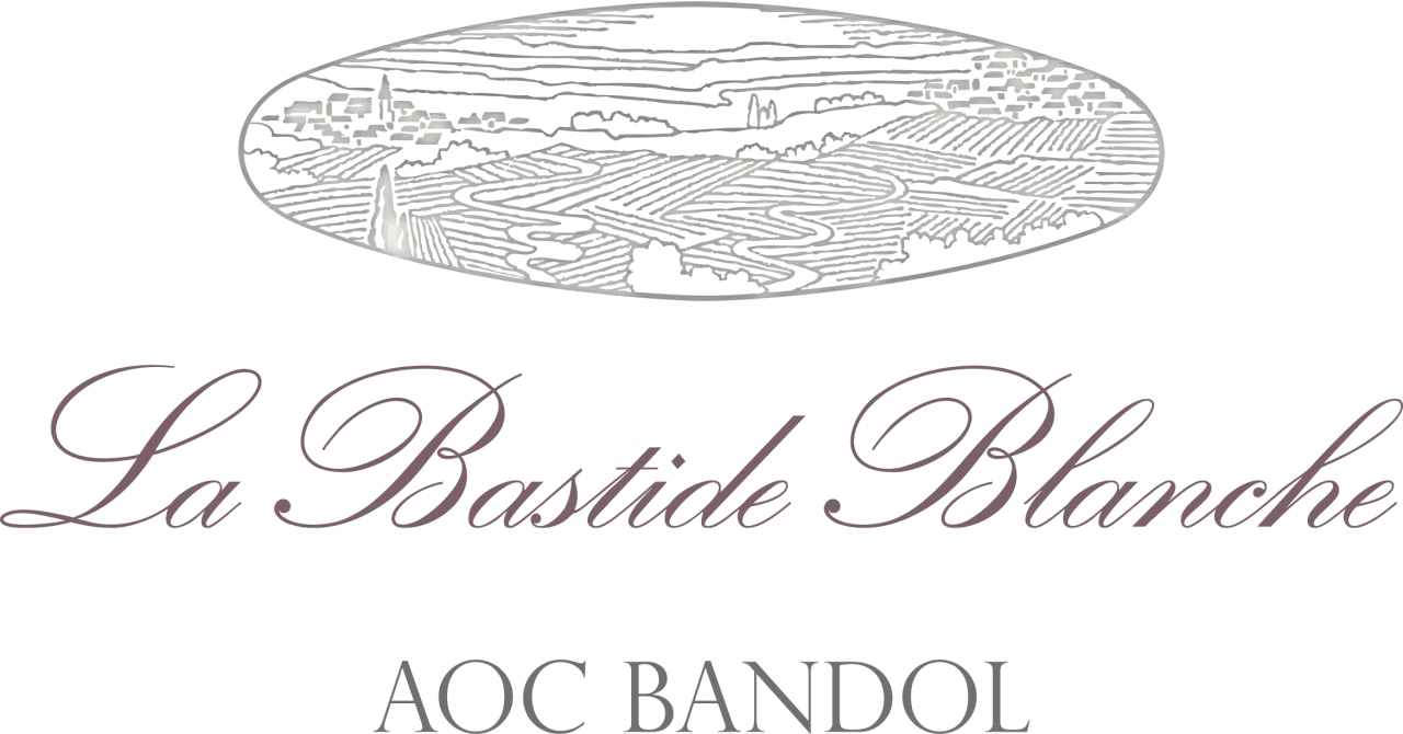 Logo de La Bastide Blanche, un domaine viticole avec un paysage de vignobles et un village.