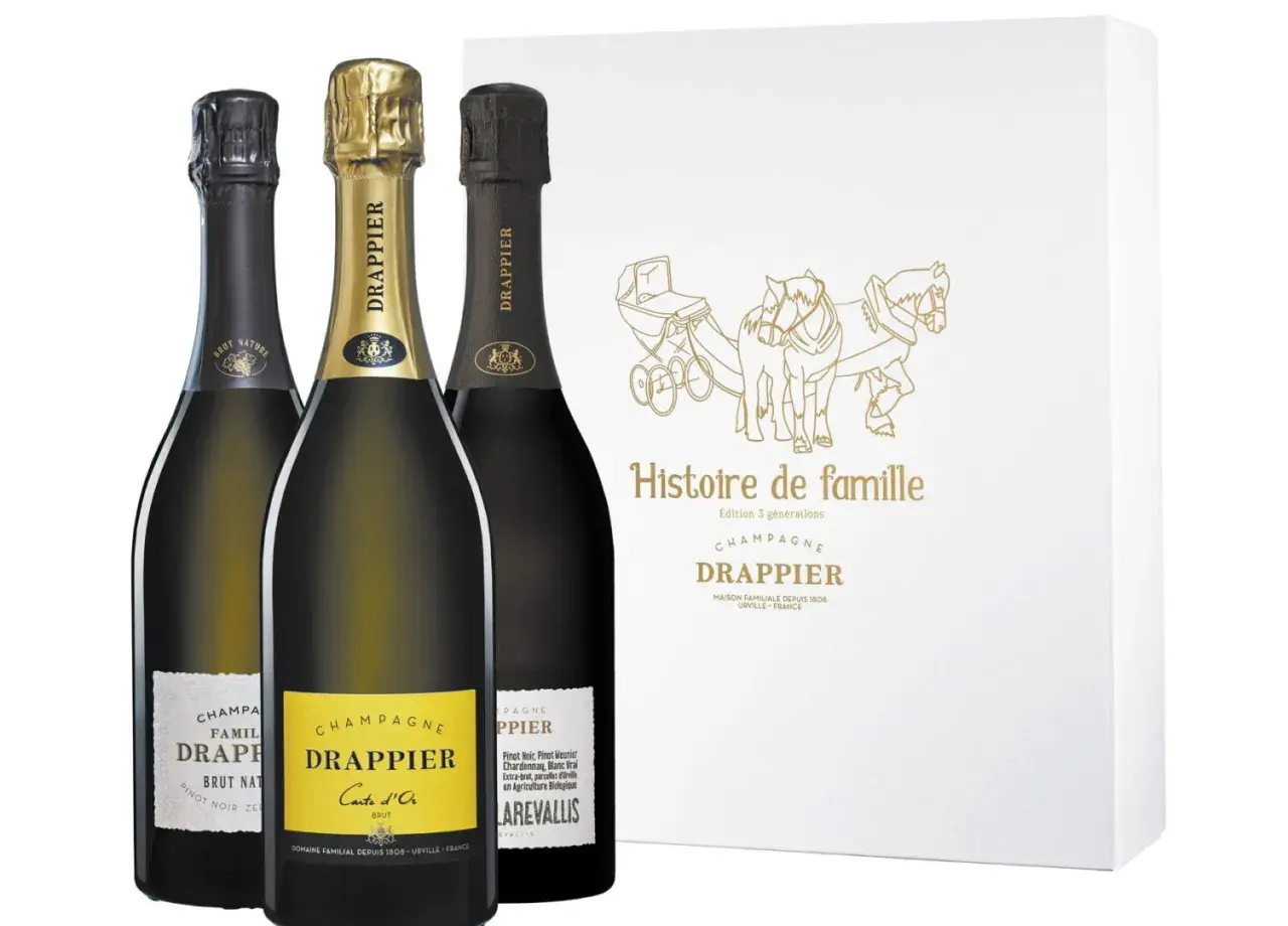Trois bouteilles de champagne Drappier, dont une Carte d'Or, et une boîte "Histoire de famille". Avis sur le champagne Drappier.