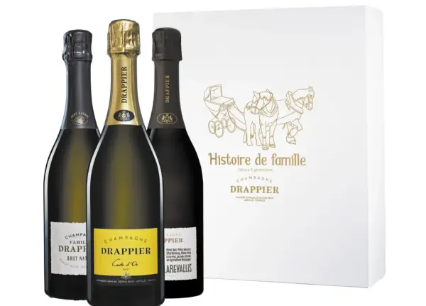 Trois bouteilles de champagne Drappier, dont une Carte d'Or, et une boîte "Histoire de famille". Avis sur le champagne Drappier.